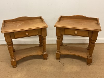 Lot 679 - A pair of pine bedside tables with a single...