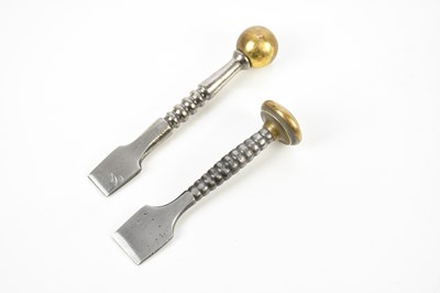 Lot 1358 - Two 18th century button hole cutters, largest...