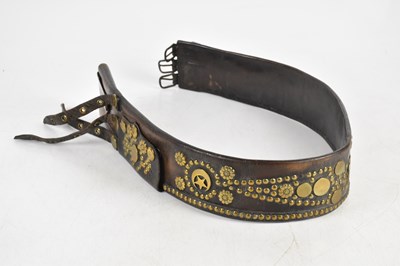 Lot 1359 - A Victorian and brass studded leather belt,...