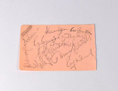 Lot 675 - MANCHESTER UNITED; a page from an autograph...