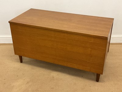 Lot 628 - A mid 20th century teak blanket box on tapered...