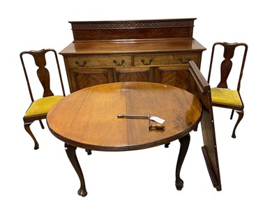Lot 1262 - An early 20th century dining suite comprising...