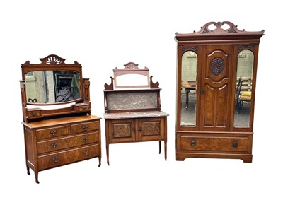 Lot 1212 - A late Victorian walnut wardrobe, with carved...