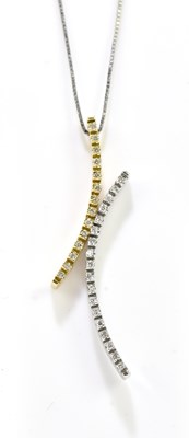 Lot 1397 - A white and yellow metal diamond set necklace,...
