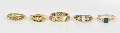 Lot 112 - An 18ct yellow gold diamond set five stone...