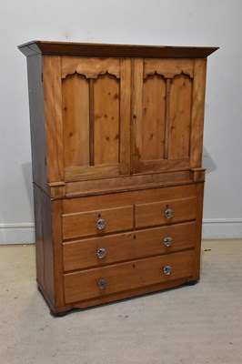 Lot 1027 - An old pine cabinet on chest, with two...