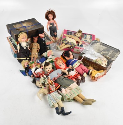 Lot 851 - A collection of vintage dolls and jigsaws...