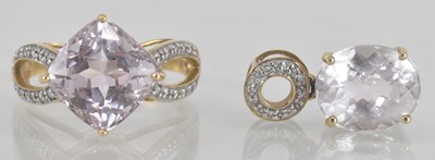 Lot 1141 - A modern 9ct gold dress ring, with cushion cut...