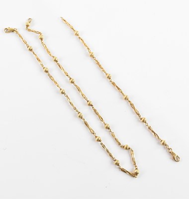 Lot 251 - A 9ct yellow gold bracelet, length 18.5cm, and...