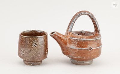 Lot 523 - PHIL ROGERS (1951-2020); a salt glazed teapot...