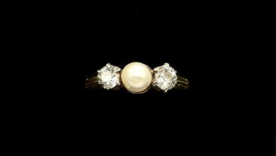 Lot 1162 - A yellow metal diamond and pearl ring, the...