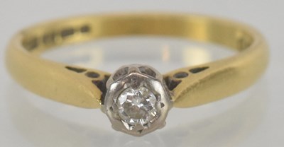 Lot 1174 - An 18ct gold diamond solitaire ring, the...