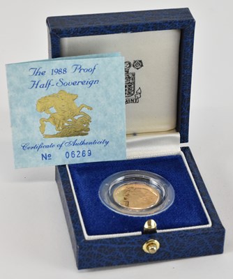 Lot 1421 - ROYAL MINT; a cased 1988 proof half sovereign,...