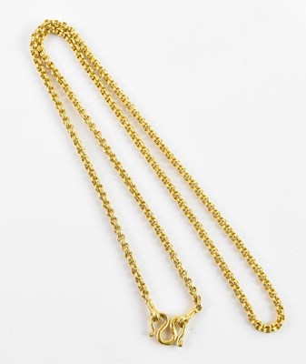 Lot 314 - A yellow metal Eastern chain, with swept clasp,...