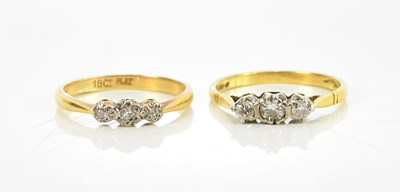 Lot 148 - Two 18ct yellow gold three stone illusion set...