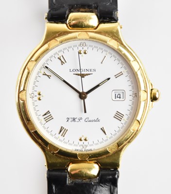 Lot 563 - LONGINES; a gentleman's 18ct yellow gold...