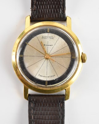 Lot 606 - BOCTOK; a vintage Russian gold plated and...