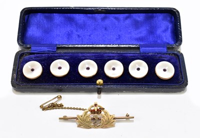 Lot 1215 - A 9ct gold and enamel naval sweetheart brooch