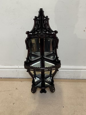 Lot 1269 - A 19th century carved mahogany corner shelf...