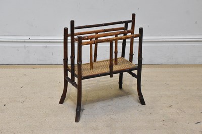 Lot 1280 - A 20th century bamboo two division magazine rack