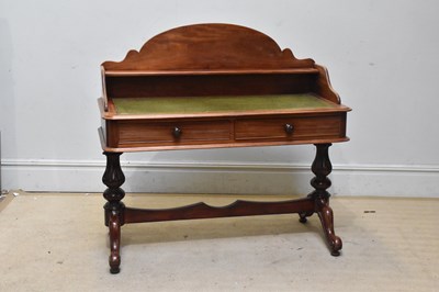 Lot 1037 - A Victorian washstand with arched raised back...