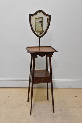 Lot 1176 - An Edwardian mahogany shaving stand, with...
