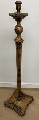 Lot 542 - An Oriental gilt painted floor lamp, 146cm high.