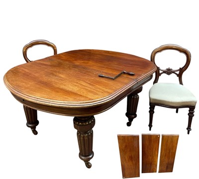Lot 1120 - A Victorian mahogany wind-out extending dining...