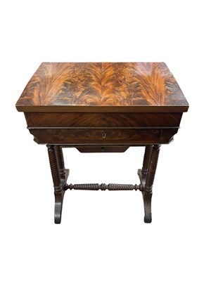 Lot 1173 - A Victorian flame mahogany sewing table, the...