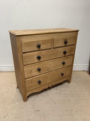 Lot 1049 - An old pine chest of two short over three long...