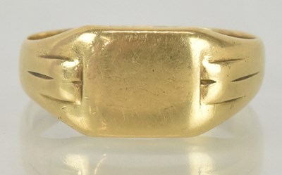 Lot 1121 - An 18ct yellow gold signet ring, size R/S,...
