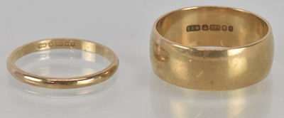 Lot 1145 - Two 9ct yellow gold wedding bands, sizes T and...