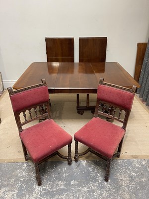 Lot 1162 - A reproduction American extending dining table...