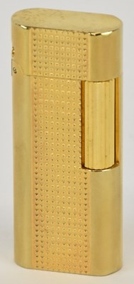 Lot 451 - IN THE STYLE OF CARTIER; a boxed gold plated...