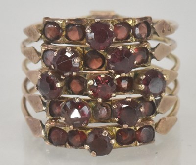 Lot 1127 - A 14ct yellow gold garnet set five-in-one...