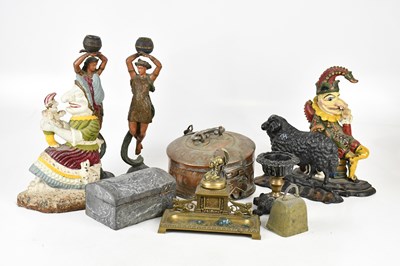 Lot 1486 - Three cast iron doorstops including painted...