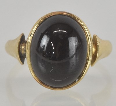 Lot 1146 - An early 19th century gold ring, with bezel...
