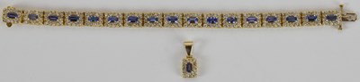 Lot 1298 - A 14K gold line bracelet, consisting of...
