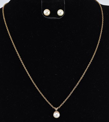Lot 1226 - A single cultured pearl necklace pendant, on...
