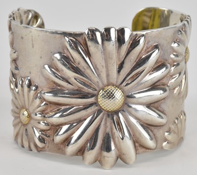 Lot 1300 - TIFFANY & CO; a silver daisy cuff bracelet,...