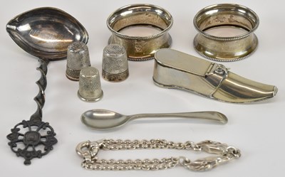 Lot 1074 - Two hallmarked silver napkin rings, two silver...