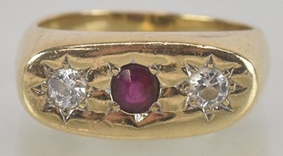 Lot 1126 - A 9ct gold ruby and diamond set ring, the flat...