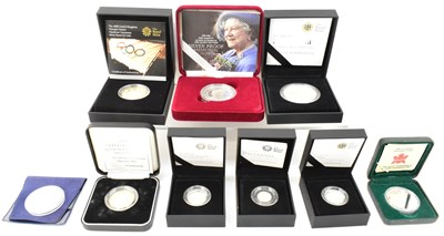 Lot 1413 - Nine silver cased collectors' coins comprising...