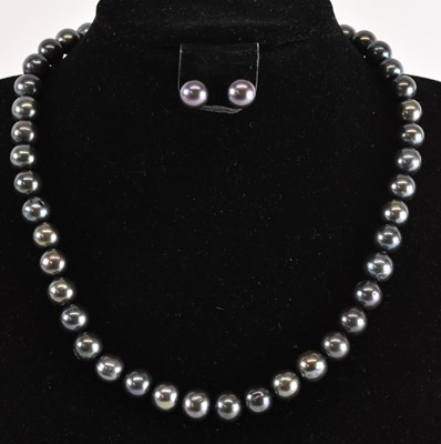 Lot 1227 - ANDERSON & WEBB; a cultured black pearl...