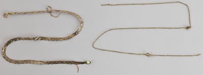 Lot 1217 - A three colour flat strand necklace with hoop...