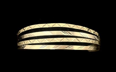 Lot 1230 - Four 9ct yellow gold bangles, each with...