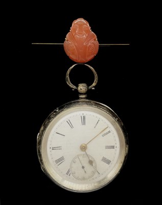 Lot 1128 - A yellow metal carved carnelian Chinese Buddha...