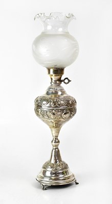 Lot 873 - A silver salt and pepper set in the form of...