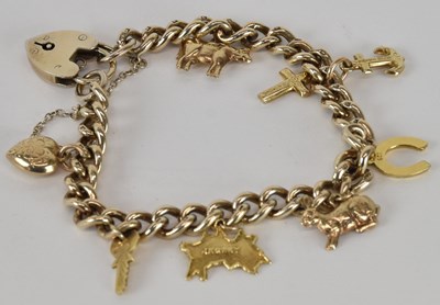 Lot 1309 - A 925 hallmarked silver charm bracelet, with...