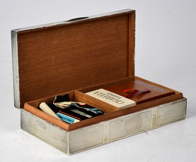 Lot 841 - A George V hallmarked silver cigarette box...